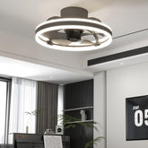 Modern ceiling fan light fixture in a room with a desk and window.